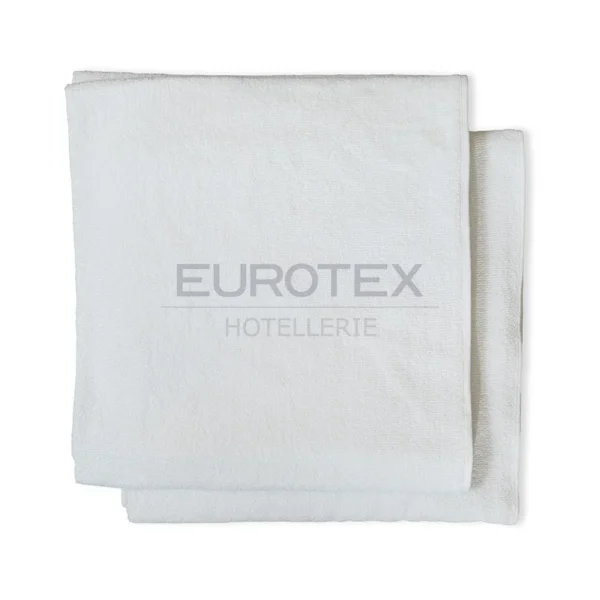 Telo massaggio in spugna bianca per centri estetici